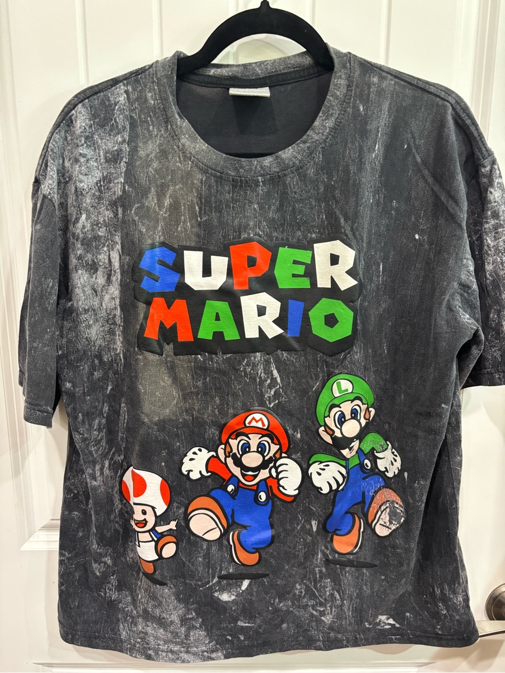 Nintendo Super Mario Black Graphic Tee with Multicolor Logo